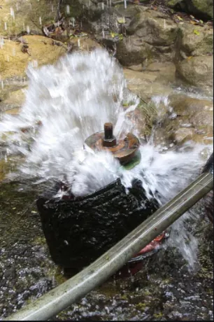 Water spraying from a broken water pipe