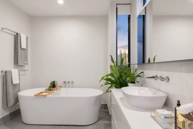 Bright, restored bathroom after water leak repairs